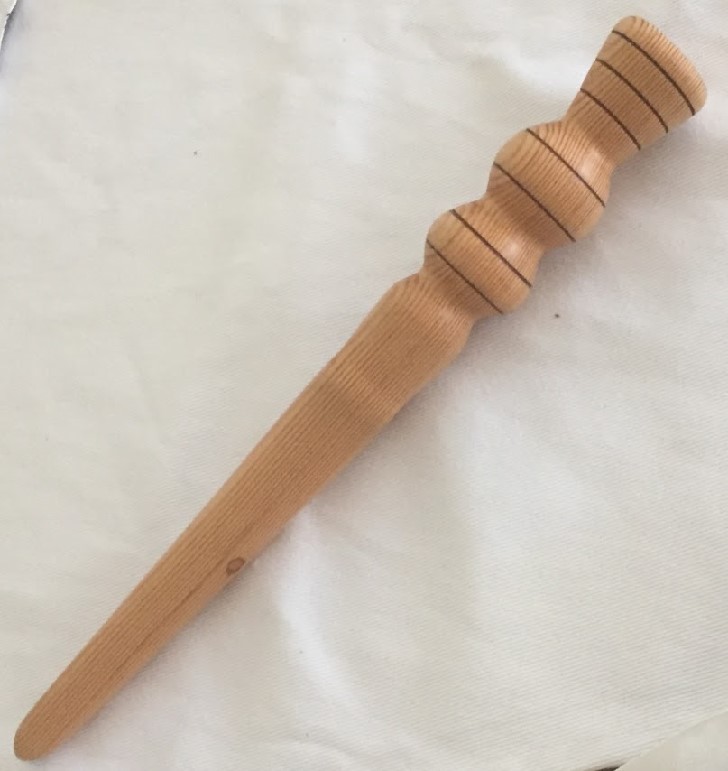 A wooden spurtle